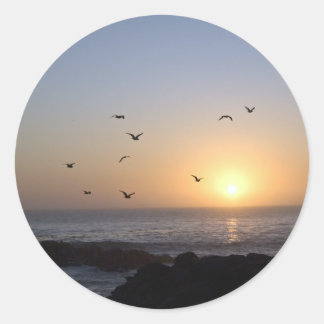 Aufkleber für den Sonnenuntergang an der Küste