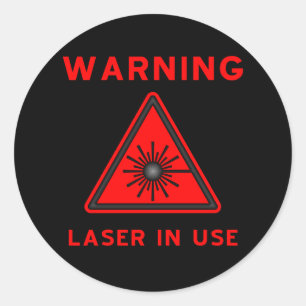 Aufkleber mit dem roten Laser-Warnsymbol