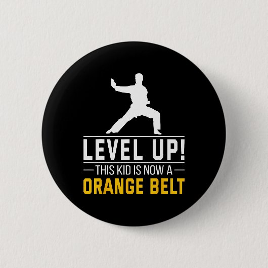 Aufsteigen! Dieses Kind hat jetzt einen orangen Gü Button (Vorderseite)