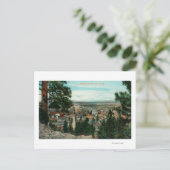 Aussicht auf die Stadt durch die Bäume Postkarte (Stehend Vorderseite)