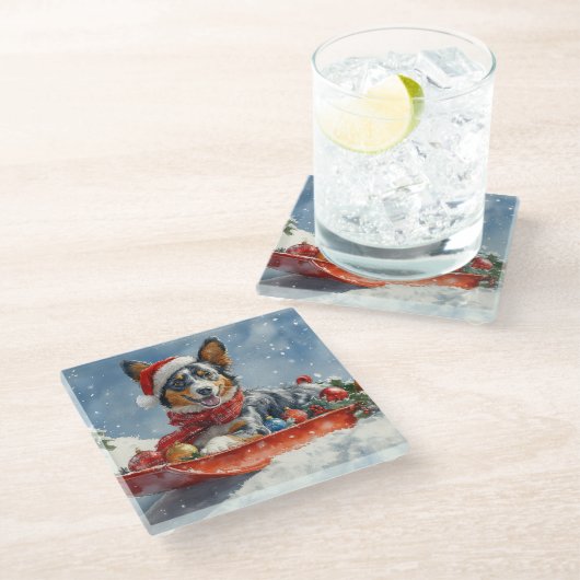 Australian Kelpie in Sledge Let it Snow Christmas Glasuntersetzer (Schrägansicht)