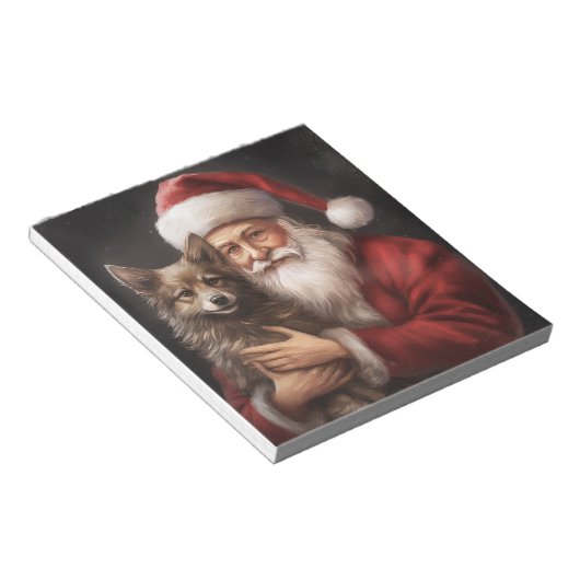 Australian Kelpie mit Weihnachten im Weihnachtsman Notizblock (angewinkelt)