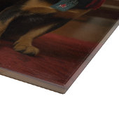 Australische Kelpie am Feuerplatz Weihnachten Schneidebrett (Ecke)