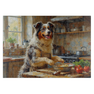 Australischer Terrier kocht in der Küche Schneidebrett