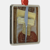 Auswahl der feinschmeckerischen Käse und des Ornament Aus Metall (Rechts)