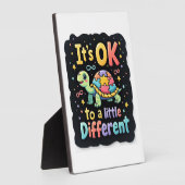 Autismus-Bewusstsein Es ist gut, ein bisschen ande Fotoplatte (Seite)