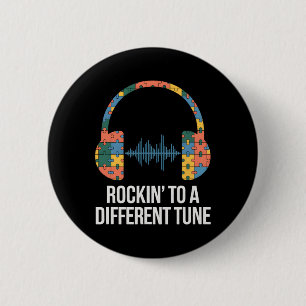Autismus-Bewusstsein Rocking To A Different Tune A Button