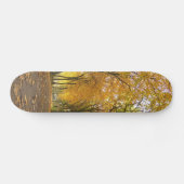 Autumn path with yellow trees and fallen leaves skateboard (Horizontal)