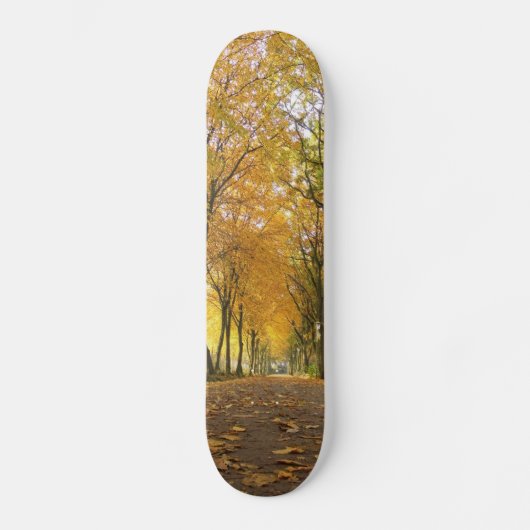 Autumn path with yellow trees and fallen leaves skateboard (Vorderseite)