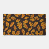 Autumnal Eicheneiche Blätter auf dunkelbraun Schreibtischunterlage (Vorderseite)