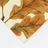 Autumnal-Eicheneiche-Blätter auf weiß Fleecedecke (Ecke)