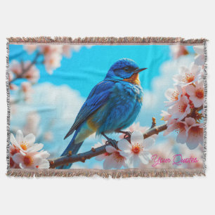 Azurblauer Vogel auf Kirschblütenzweig Decke