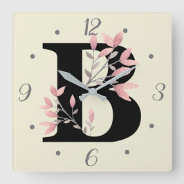 B Monogramm mit rosa Spray Quadratische Wanduhr