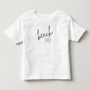 Baby am Strand. Kleinkinder-T - Shirt