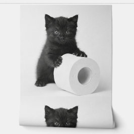 Baby Black Kitten Guarding Toilet Paper Roll On Tapete