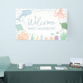 Baby-Dusche unter der Meerestierdusche Banner (Messeveranstaltung)