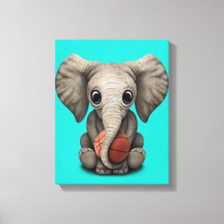 Baby Elephant Playing With Basketball Leinwanddruck