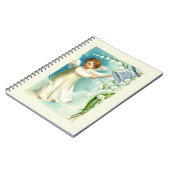 Baby Engel mit blauem Glöckchen  Notizblock (Linke Seite)