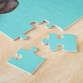 Baby-Flusspferd, das eine Weihnachtsmannmütze Puzzle (Seite)