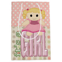 Baby Girl Doll on Quilt