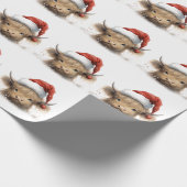 Baby Highland Cow mit Weihnachtsmannmütze Geschenkpapier (Ecke)