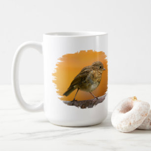 Baby Robin auf einem Baumzweig Kaffeetasse