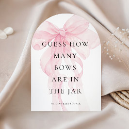 Baby Shower Karte mit rosa Schleife und dem Spiel 