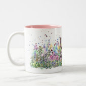 Baby-Ziege auf dem Blumen-Gebiet Zweifarbige Tasse (Links)