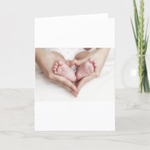Babyfüße in den Mutterhänden Karte