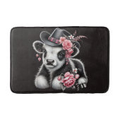 Babykuh in einem stilvollen Hut mit rosa Blüten Badematte (Vorderseite)