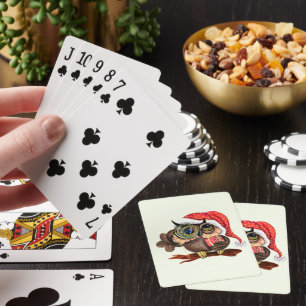Babyschale in Weihnachtshut Kartenspielen Spielkarten