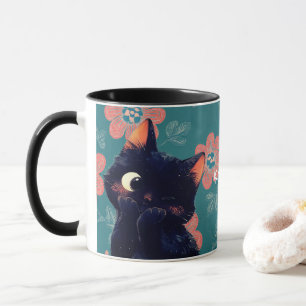 Backenschwarze Kätzchen mit floralem Hintergrund Tasse