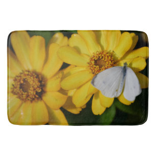 Bad-Matte/Gänseblümchen und Schmetterling Badematte