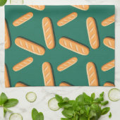 Baguette-Brotmuster auf grünem Hintergrund Geschirrtuch (Gefaltet)