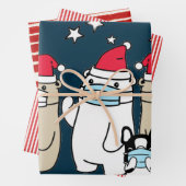 BÄHRE, DIE MASKEN UND WEIHNACHTSMANNMÜTZEN TRAPPIN GESCHENKPAPIER SET (Beispiel)