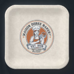 Bakery Store Pastry Chef Dessert Sweets Cake Baker Pappteller<br><div class="desc">This vintage-style circular logo features a cheerful female pastry chef wearing a traditional white chef's hat and apron. She is framed by a warm orange circular backdrop and holds a wire whisk in one hand and a flaky croissant in the other, symbolizing her culinary expertise. Below her, a blank, elegant...</div>