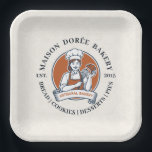Bakery Store Pastry Chef Dessert Sweets Cake Baker Pappteller<br><div class="desc">This vintage-style circular logo features a cheerful female pastry chef wearing a traditional white chef's hat and apron. She is framed by a warm orange circular backdrop and holds a wire whisk in one hand and a flaky croissant in the other, symbolizing her culinary expertise. Below her, a blank, elegant...</div>