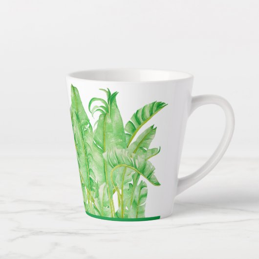 Banana-Blätter auf einer kleinen Latte-Tasse Milchtasse (Rechts)