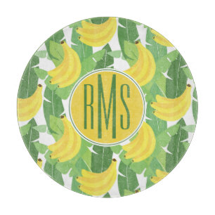 Bananen-Blätter und Monogramm des Frucht-Muster-  Schneidebrett