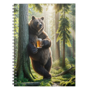 Bär, der im Wald ein Bier hält Notizblock
