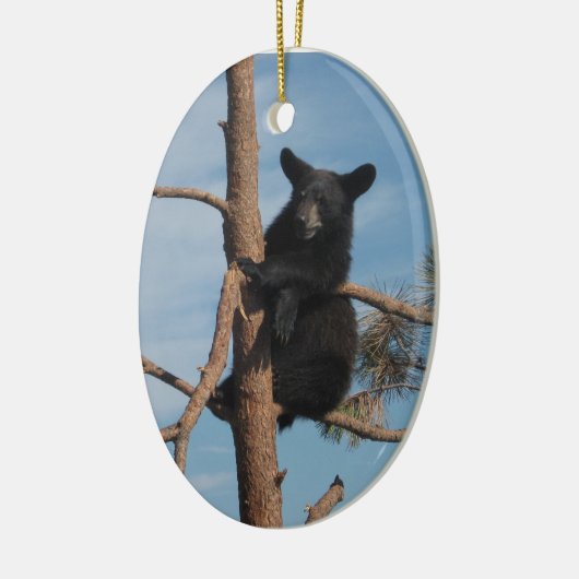 Bärenjunges in einem Baum Keramikornament (Links)
