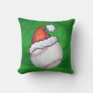 Baseball in Weihnachtsmannmütze über Grün Kissen