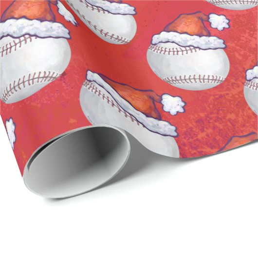 Baseball mit Weihnachtsmannmütze auf Rot Geschenkpapier (Rolleneckpunkt)
