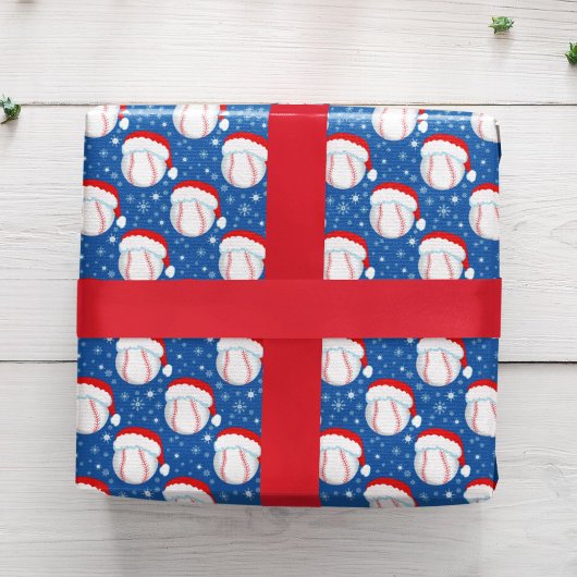 Baseballs tragen den Hut und die Schneeflocken Den Geschenkpapier