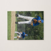 Baseballspieler, der sich darauf vorbereitet, den  puzzle (Horizontal)