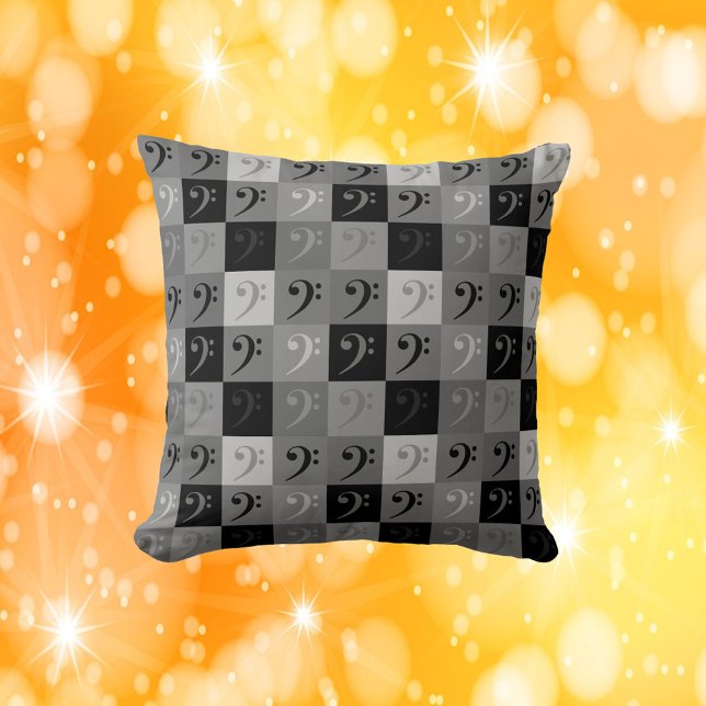 Bass Clef Black and Gray Kissen (A throw pillow with a bass clef pattern in blacks and grays)