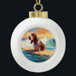 Basset Hound Beach Surfen Malerei Keramik Kugel-Ornament<br><div class="desc">Tauchen Sie ein in die spielerische Welt des Kaninchen-Abenteuers mit diesem faszinierenden Bild. Ein gepflegter Hund geht zu den Wellen und reitet geschickt auf einem sonnengeküssten Strand. Das lebendige Kunstwerk vereint wunderbar das Wesentliche der Erregung am Strand, während der Hund furchtlos auf den Wellen reitet und den Geist von Spaß...</div>
