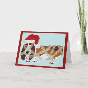 Basset Hound in Christbaumschmuck verheddert Karte