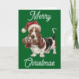 Basset Hound mit Weihnachtsmannmütze Geschenk im M Karte
