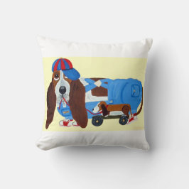 Basset Hound mit Zugspielzeug Kissen
